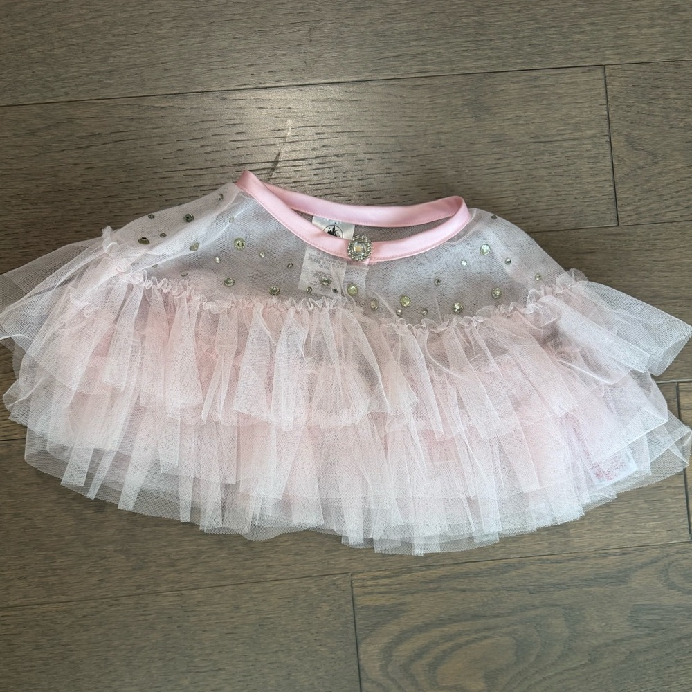 Like new Disney Store pink ruffled bolero with rhinestones - Size XS/S